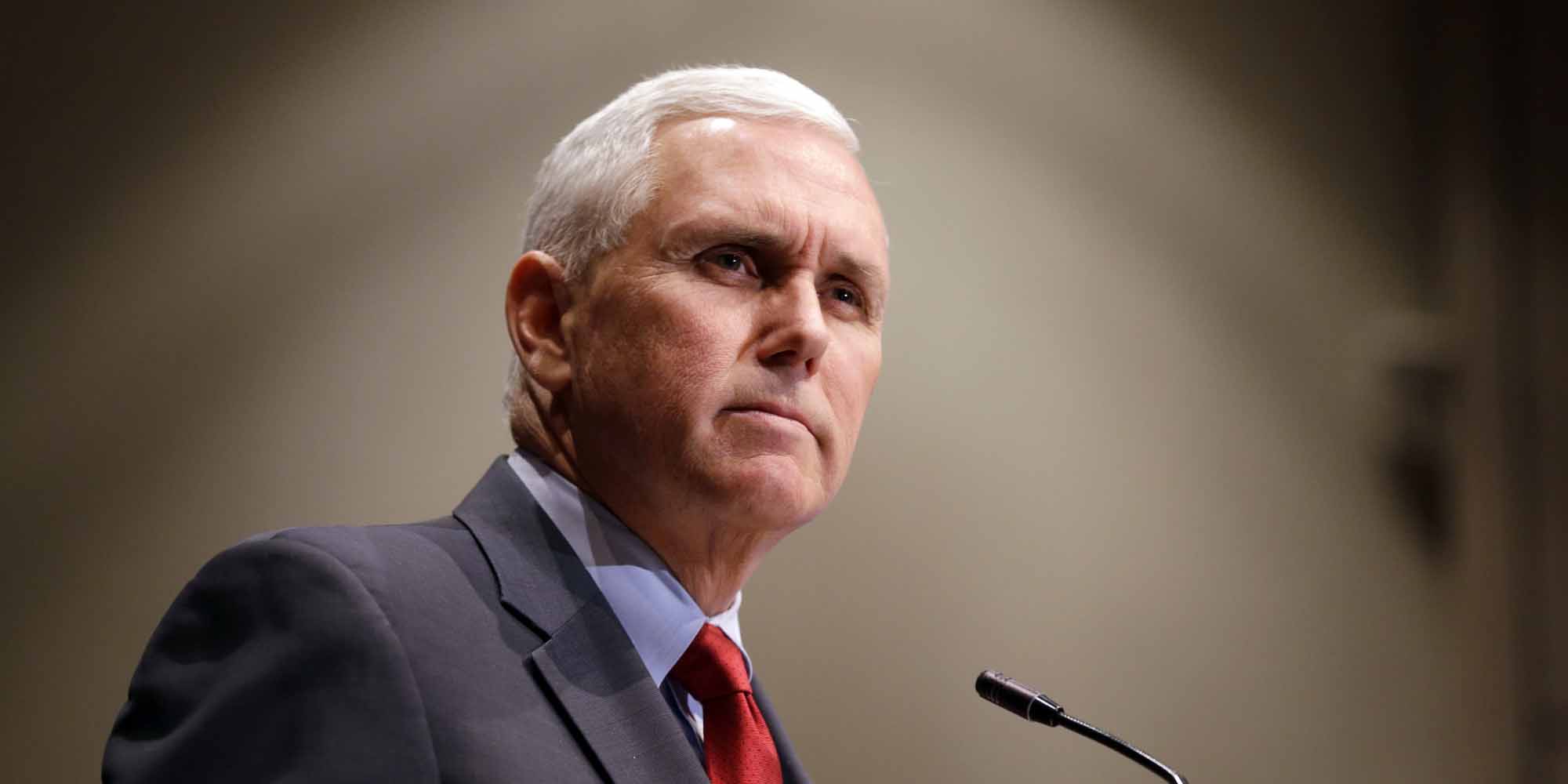 Indiana Gov. Mike Pence announces that the Centers for Medicaid and Medicare Services had approved the state's waiver request for the plan his administration calls HIP 2.0 during a speech in Indianapolis, Tuesday, Jan. 27, 2015. (AP Photo/Michael Conroy)